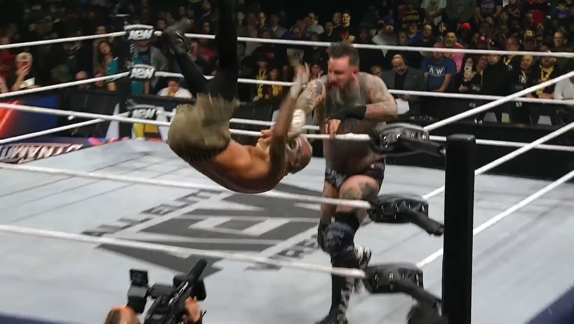 Darby Allin makes the Cameraman's acquaintance during his World Title defense